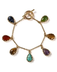 This vivid Lauren Ralph Lauren charm bracelet takes its inspiration from far flung locales, in textured gold plated metal. An array of multi hued stones add allure. This vivid Lauren Ralph Lauren charm bracelet takes its inspiration from far flung locales, in textured gold plated metal. An array of multi hued stones add allure.