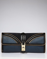 The power clutch is this season's hit handbag, and this Burberry style refines the trend, comprised of leather and detailed by a gleaming turnlock closure. The power clutch is this season's hit handbag, and this Burberry style refines the trend, comprised of leather and detailed by a gleaming turnlock closure.