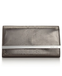 Shine bright all night with this glam goodie from MICHAEL Michael Kors. Croc-embossed leather and gleaming signature detailing lend a luxe look, while the sleek shape tucks effortlessly under your arm. Shine bright all night with this glam goodie from MICHAEL Michael Kors. Croc-embossed leather and gleaming signature detailing lend a luxe look, while the sleek shape tucks effortlessly under your arm.