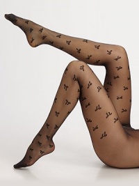 Get wrapped up in these adorable sheer tights, decorated with individual sweet bows. Soft, smooth waistbandFlat toe seam80% polyamide/12% elastane/8% polyesterHand washMade in Austria Get wrapped up in these adorable sheer tights, decorated with individual sweet bows. Soft, smooth waistbandFlat toe seam80% polyamide/12% elastane/8% polyesterHand washMade in Austria