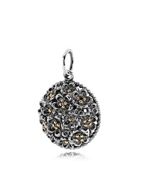 Send yourself a boutique that's always in bloom. PANDORA's sterling silver floral pendant is accented with luxe 14K gold and black spinel details.