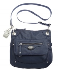 A sleek take on the so-trendy crossbody, the Simple purse features grommet hardware, dome studs and a dual zip-flap front pocket for stylish convenience. A sleek take on the so-trendy crossbody, the Simple purse features grommet hardware, dome studs and a dual zip-flap front pocket for stylish convenience.