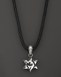A sterling silver star on a rugged leather chain. From the John Hardy Dayak collection. A sterling silver star on a rugged leather chain. From the John Hardy Dayak collection.