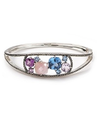 A striking bangle is just the thing to enliven your wardrobe. This simple silver style from Judith Jack features multi colored stones and a shapely design. A striking bangle is just the thing to enliven your wardrobe. This simple silver style from Judith Jack features multi colored stones and a shapely design.