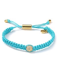 Tie on bold style with this wrap bracelet from MICHAEL Michael Kors. Crafted from woven cord and accented by a fireball station, it perfects effortless glamor. Tie on bold style with this wrap bracelet from MICHAEL Michael Kors. Crafted from woven cord and accented by a fireball station, it perfects effortless glamor.