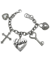 GUESS makes an elegant statement with this charm bracelet. Crafted from silver-tone mixed metal, the bracelet gets a sophisticated touch with glass crystals. Item comes packaged in a signature GUESS Gift Box. Approximate length: 7-1/2 inches. Approximate drop: 1-1/2 inches. Approximate diameter: 1-1/2 inches. GUESS makes an elegant statement with this charm bracelet. Crafted from silver-tone mixed metal, the bracelet gets a sophisticated touch with glass crystals. Item comes packaged in a signature GUESS Gift Box. Approximate length: 7-1/2 inches. Approximate drop: 1-1/2 inches. Approximate diameter: 1-1/2 inches.