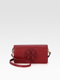 Luxurious pebbled leather with a perforated, signature logo emblem.Detachable adjustable shoulder strap, 20½-22½ dropMagnetic snap flap closureOne inside open pocketCotton lining8W X 4½H X 1½DImported Luxurious pebbled leather with a perforated, signature logo emblem.Detachable adjustable shoulder strap, 20½-22½ dropMagnetic snap flap closureOne inside open pocketCotton lining8W X 4½H X 1½DImported