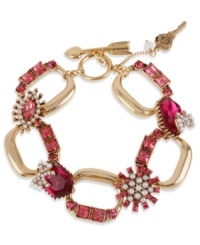 A little romance from Betsey Johnson! This toggle bracelet features fuchsia-colored crystal accents, glass pearls and key and arrow charms. Crafted in antiqued gold tone mixed metal. Approximate length: 8 inches. A little romance from Betsey Johnson! This toggle bracelet features fuchsia-colored crystal accents, glass pearls and key and arrow charms. Crafted in antiqued gold tone mixed metal. Approximate length: 8 inches.