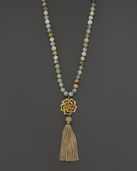A carved pendant finished with bold tassel lends exotic flair to this beaded aquamarine necklace from Lara Gold for LTC. A carved pendant finished with bold tassel lends exotic flair to this beaded aquamarine necklace from Lara Gold for LTC.