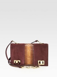 Luxurious snake panel surrounded by soft suede in this chic convertible design.Detachable adjustable chain and snake shoulder strap, 21-22 dropTurnlock flap closureOne inside zip pocketTwo inside open pocketsLeather lining11½W X 6¾H X 2¾DMade in Italy Luxurious snake panel surrounded by soft suede in this chic convertible design.Detachable adjustable chain and snake shoulder strap, 21-22 dropTurnlock flap closureOne inside zip pocketTwo inside open pocketsLeather lining11½W X 6¾H X 2¾DMade in Italy