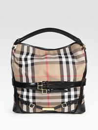 A perfect slouchy shape for all of your essential items, crafted in the classic canvas Burberry check with sleek leather trim. Leather top handle, 3 dropDetachable leather shoulder strap, 9½ dropOne inside zip compartmentOne inside zip pocketCotton lining10W X 12H X 5DMade in Italy A perfect slouchy shape for all of your essential items, crafted in the classic canvas Burberry check with sleek leather trim. Leather top handle, 3 dropDetachable leather shoulder strap, 9½ dropOne inside zip compartmentOne inside zip pocketCotton lining10W X 12H X 5DMade in Italy
