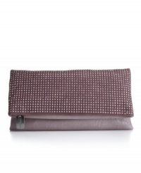 Steal the spotlight with BCBGeneration's sparkly and eye-catching Lola clutch. Steal the spotlight with BCBGeneration's sparkly and eye-catching Lola clutch.
