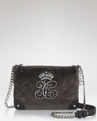 Size down and glam up with this lush, velour crossbody bag from Juicy Couture, punctuated by leather straps and rhinestone detailing. Size down and glam up with this lush, velour crossbody bag from Juicy Couture, punctuated by leather straps and rhinestone detailing.
