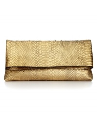 Rock the reptilian rave with this chic snakeskin-print clutch from Juicy Couture. Luxe leather in shimmery metallic dresses the outside, while the spacious interior stows your out-on-the-town essentials with ease. Rock the reptilian rave with this chic snakeskin-print clutch from Juicy Couture. Luxe leather in shimmery metallic dresses the outside, while the spacious interior stows your out-on-the-town essentials with ease.