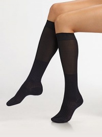 A warm, classic style in a striped design with opaque foot and a semi-sheer leg. Ribbed cuffFlat toe seam75% wool/25% silkHand washMade in Italy A warm, classic style in a striped design with opaque foot and a semi-sheer leg. Ribbed cuffFlat toe seam75% wool/25% silkHand washMade in Italy