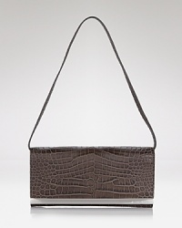 Made for late-night revelry and romantic evenings out, this MICHAEL Michael Kors croc-embossed clutch is a cornerstone of your off-hours wardrobe. Made for late-night revelry and romantic evenings out, this MICHAEL Michael Kors croc-embossed clutch is a cornerstone of your off-hours wardrobe.