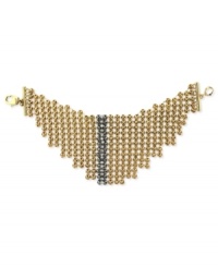 Meshing together quite nicely. BCBGeneration's bracelet is crafted from gold-tone mixed metal with a black crystal strip down the center to create an even bolder effect. Approximate length: 8 inches. Meshing together quite nicely. BCBGeneration's bracelet is crafted from gold-tone mixed metal with a black crystal strip down the center to create an even bolder effect. Approximate length: 8 inches.