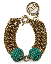 This turquoise-accented Giles & Brother bracelet is cast in antiqued brass, perfectly capturing the nautical trend with bit of industrial, downtown grit. This turquoise-accented Giles & Brother bracelet is cast in antiqued brass, perfectly capturing the nautical trend with bit of industrial, downtown grit.