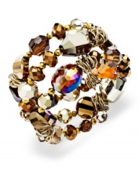 The age of bronze. Style&co.'s coil bracelet is crafted from bronze gold-tone mixed metal with an array of luminous beads coiling around your wrist. Approximate diameter: 2 inches. The age of bronze. Style&co.'s coil bracelet is crafted from bronze gold-tone mixed metal with an array of luminous beads coiling around your wrist. Approximate diameter: 2 inches.