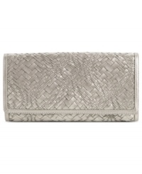 Add some optical illusion to your evening out with this intricately woven leather clutch from Cole Haan. Sleek and slim design discretely stows phone, lipstick and ID. Add some optical illusion to your evening out with this intricately woven leather clutch from Cole Haan. Sleek and slim design discretely stows phone, lipstick and ID.