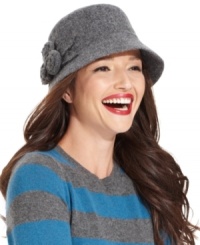 With a retro silhouette and flirty floral accent, this wool hat from Nine West has a contemporary chic feel. With a retro silhouette and flirty floral accent, this wool hat from Nine West has a contemporary chic feel.