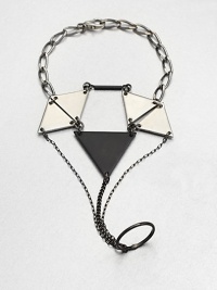 From the Facet Collection. This distinctive design of powder-coated brass and pewter triangles clasps around the wrist, slips around one finger and drapes across the hand for eye-catching drama.Powder-coated brass and pewterLength around wrist, about 8 (adjustable)Lobster claspMade in USA From the Facet Collection. This distinctive design of powder-coated brass and pewter triangles clasps around the wrist, slips around one finger and drapes across the hand for eye-catching drama.Powder-coated brass and pewterLength around wrist, about 8 (adjustable)Lobster claspMade in USA