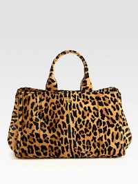 Leopard-print haircalf tote with hardware logo detail.Double top handles, 7 dropOpen topMagnetic snap gussetsProtective metal feetTwo inside zip pocketsThree inside open pocketsSignature jacquard lining16W X 10H X 10DMade in Italy Leopard-print haircalf tote with hardware logo detail.Double top handles, 7 dropOpen topMagnetic snap gussetsProtective metal feetTwo inside zip pocketsThree inside open pocketsSignature jacquard lining16W X 10H X 10DMade in Italy