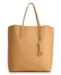 Whether jet-setting around the world or navigating through the concrete jungle, this sleek leather style from MICHAEL Michael Kors will help you do it in style. A take-anywhere tote silhouette accented with 18K gold hardware and a signature logo at front. Whether jet-setting around the world or navigating through the concrete jungle, this sleek leather style from MICHAEL Michael Kors will help you do it in style. A take-anywhere tote silhouette accented with 18K gold hardware and a signature logo at front.