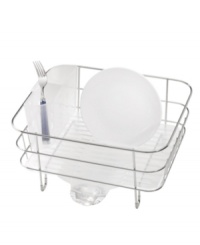 Wash, rinse and dry even in the smallest spaces. Compact and sturdy, this rust- and corrosion-resistant rack fits perfectly in the sink or on the countertop, cleaning up easily with removable parts and a dishwasher-safe construction. Making no more mess, the drip tray features a stainless steel spout to take excess water straight into the sink. 5-year warranty. Wash, rinse and dry even in the smallest spaces. Compact and sturdy, this rust- and corrosion-resistant rack fits perfectly in the sink or on the countertop, cleaning up easily with removable parts and a dishwasher-safe construction. Making no more mess, the drip tray features a stainless steel spout to take excess water straight into the sink. 5-year warranty.