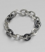From the Chain Collection. A trinity of signature cable, plain, and black ceramic oval links.Ceramic Sterling silver Length, about 7½ Lobster clasp closure Imported 