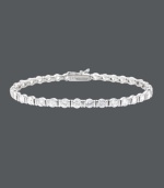 For a look that's red-carpet worthy...strike a pose in B. Brilliant! This eye-catching tennis bracelet features dozens of sparkling, channel-set cubic zirconias (10 ct. t.w.). Crafted in sterling silver. Approximate length: 7-1/4 inches.