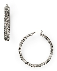 A jewel box staple from T Tahari, these chain link earrings bring simply-styled glamor to your look, cast in silver plated metal. A jewel box staple from T Tahari, these chain link earrings bring simply-styled glamor to your look, cast in silver plated metal.