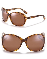 Tom Ford's round oversized sunglasses with metal logo detail at temples embodies chic to a T. Tom Ford's round oversized sunglasses with metal logo detail at temples embodies chic to a T.