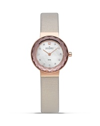 Stainless steel and leather bracelet watch from Skagen with a faceted silver dial and crystal markers. This understated timepiece boasts a slim profile and advanced Japanese quartz movement for a sleek combination of form and function. Stainless steel and leather bracelet watch from Skagen with a faceted silver dial and crystal markers. This understated timepiece boasts a slim profile and advanced Japanese quartz movement for a sleek combination of form and function.