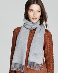 Burberry does up its solid scarf in a luxurious pale gray cashmere with an embroidered horse detail. Burberry does up its solid scarf in a luxurious pale gray cashmere with an embroidered horse detail.