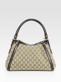Signature jacquard logo, in a structured top handle silhouette trimmed with rich leather and studded interlocking G detail.Top handle, 6¾ dropTop zip closureOne inside zip pocketTwo inside open pocketsLinen lining13W X 8½H X 3DMade in Italy Signature jacquard logo, in a structured top handle silhouette trimmed with rich leather and studded interlocking G detail.Top handle, 6¾ dropTop zip closureOne inside zip pocketTwo inside open pocketsLinen lining13W X 8½H X 3DMade in Italy