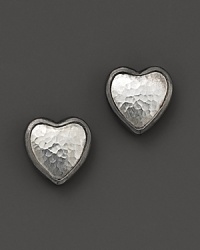 Hammered sterling silver heart earrings make a romantic, modern statement. Hammered sterling silver heart earrings make a romantic, modern statement.
