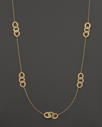 Hammered 18K yellow gold stations decorate a delicate chain on this timeless Roberto Coin necklace. Hammered 18K yellow gold stations decorate a delicate chain on this timeless Roberto Coin necklace.