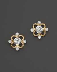 Faceted diamonds shine in 14K. yellow and white gold settings. Faceted diamonds shine in 14K. yellow and white gold settings.