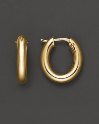 Bold oval hoops, in 18K yellow gold. By Roberto Coin. Bold oval hoops, in 18K yellow gold. By Roberto Coin.