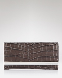 This MICHAEL Michael Kors carryall fits the bill for endlessly busy days, crafted of exotically embossed leather with ample essential-organizing pockets. This MICHAEL Michael Kors carryall fits the bill for endlessly busy days, crafted of exotically embossed leather with ample essential-organizing pockets.