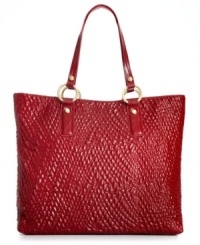 Get on-trend instantly with this elegant and alluring design from Ivanka Trump. The eye-catching, quilted exterior is highlighted with faceted golden studs and O-ring details, while the spacious interior lets you carry everything you need with endless convenience and style. Get on-trend instantly with this elegant and alluring design from Ivanka Trump. The eye-catching, quilted exterior is highlighted with faceted golden studs and O-ring details, while the spacious interior lets you carry everything you need with endless convenience and style.
