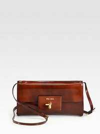 Brushed calfskin leather style in a convertible design.Detachable adjustable shoulder strap, 20-22 dropClock lock flap closureOne inside zip pocketOnr inside open pocketSignature jacquard lining10W X 5½H X 1¾DMade in Italy Brushed calfskin leather style in a convertible design.Detachable adjustable shoulder strap, 20-22 dropClock lock flap closureOne inside zip pocketOnr inside open pocketSignature jacquard lining10W X 5½H X 1¾DMade in Italy