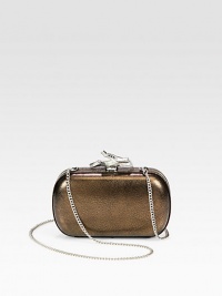 A cocktail must-have in shimmering metallic raffia with a goldtone chain and twig-shaped clasp.Detachable shoulder strap, 20¾ dropClasp closureOne inner open compartmentFully lined5¼W X 3½H X 1½DImported A cocktail must-have in shimmering metallic raffia with a goldtone chain and twig-shaped clasp.Detachable shoulder strap, 20¾ dropClasp closureOne inner open compartmentFully lined5¼W X 3½H X 1½DImported