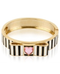 What's black and white and raved all over? This bracelet from Betsey Johnson, which is crafted from antique gold-tone mixed metal with a bow, stripes and a heart-shaped crystal accent for a whimsical touch. Item comes packaged in a signature Betsey Johnson Gift Box. Approximate diameter: 2-1/2 inches. What's black and white and raved all over? This bracelet from Betsey Johnson, which is crafted from antique gold-tone mixed metal with a bow, stripes and a heart-shaped crystal accent for a whimsical touch. Item comes packaged in a signature Betsey Johnson Gift Box. Approximate diameter: 2-1/2 inches.