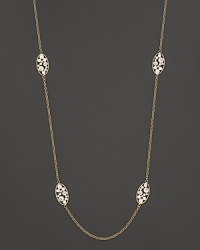 Diamonds set in enamel and 18K. white gold. By Roberto Coin. Diamonds set in enamel and 18K. white gold. By Roberto Coin.