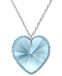 Romantic serenity. Swarovki's aqua-hued Reverie pendant presents a heart full of love. Crafted in silver tone mixed metal, a perfectly-faceted Aquamarine crystal is wrapped in a delicate Pointiage edging. Approximate length: 15 inches. Approximate drop: 3/4 inch. Romantic serenity. Swarovki's aqua-hued Reverie pendant presents a heart full of love. Crafted in silver tone mixed metal, a perfectly-faceted Aquamarine crystal is wrapped in a delicate Pointiage edging. Approximate length: 15 inches. Approximate drop: 3/4 inch.