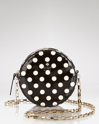 Get spotted: This kate spade new york crossbody hits the dot with its coolly circular shape, finished in glossy, printed patent leather. Get spotted: This kate spade new york crossbody hits the dot with its coolly circular shape, finished in glossy, printed patent leather.