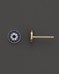 Dazzling diamond and sapphire evil eye stud earrings in yellow gold from Meira T. Dazzling diamond and sapphire evil eye stud earrings in yellow gold from Meira T.