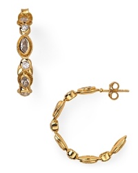 The hoop earring is a have-forever jewel box staple, and this delicate pair from Melinda Maria is sure to shine on, crafted of 14-karat gold plate. The hoop earring is a have-forever jewel box staple, and this delicate pair from Melinda Maria is sure to shine on, crafted of 14-karat gold plate.